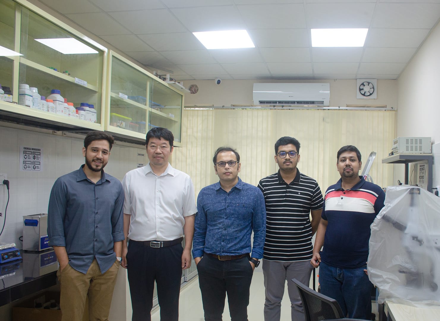 Wei Liu Chairman of the Professorial Committee School of Integrated Circuits Wuhan University visited our Lab